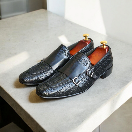 Expertly crafted with premium leather, the Hex-dubtee double monk shoe exudes quality and style. Each pair is handmade, ensuring a unique and lasting fit for any occasion. Elevate your wardrobe with this timeless and luxurious addition.