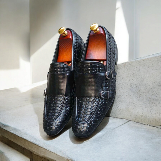 Expertly crafted with premium leather, the Hex-dubtee double monk shoe exudes quality and style. Each pair is handmade, ensuring a unique and lasting fit for any occasion. Elevate your wardrobe with this timeless and luxurious addition.